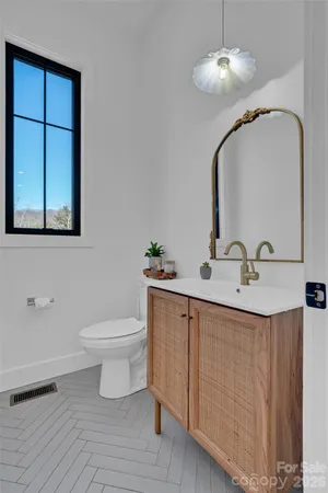 a bedroom with a bed and dresser