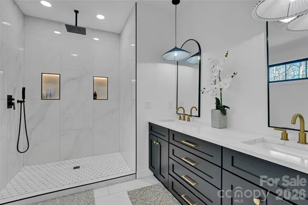 a living room with furniture a dining table and a large window