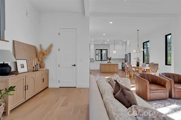 a dining room with furniture and window