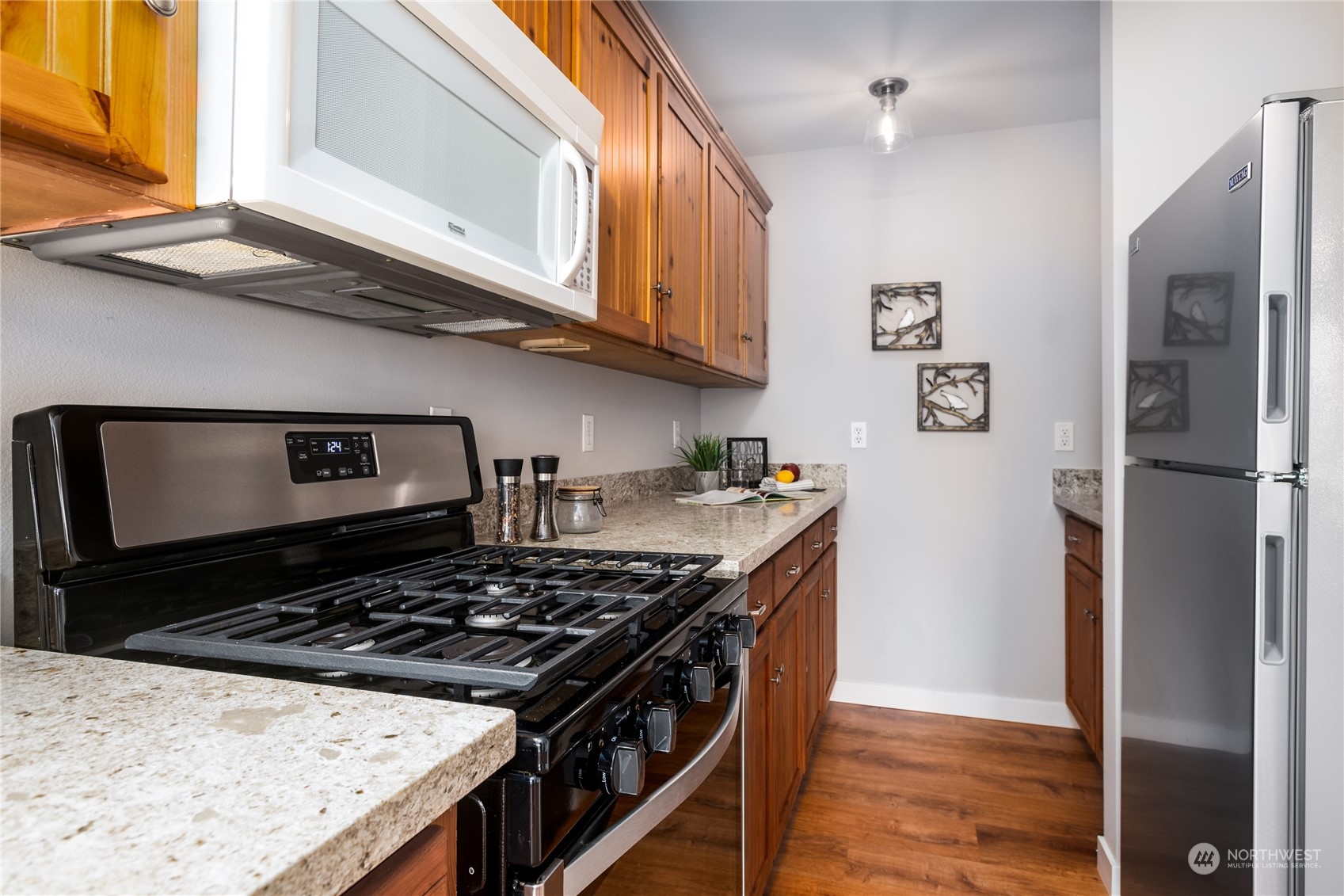 5701 Lerch Road Snohomish, WA 98290 - Photo 12 of 34 a kitchen with stainless steel appliances granite countertop a stove and a refrigerator