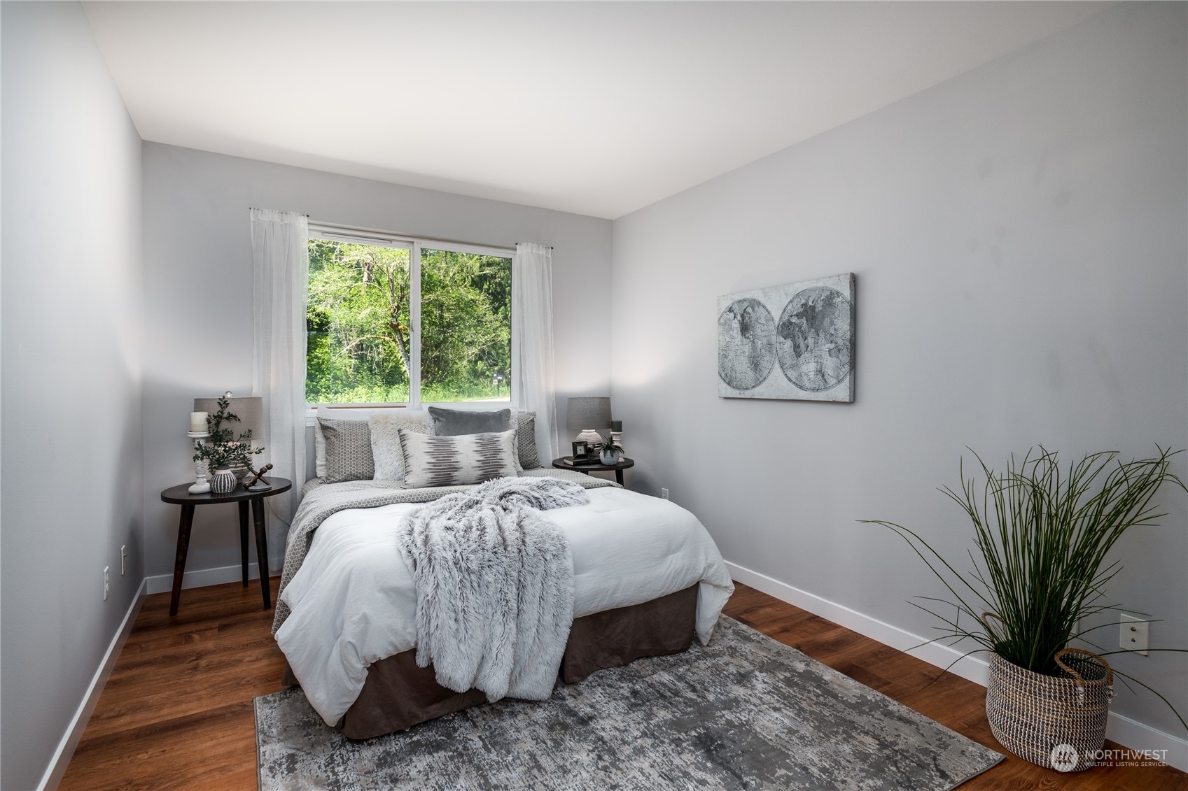 5701 Lerch Road Snohomish, WA 98290 - Photo 14 of 34 a bed room with a bed and a potted plant