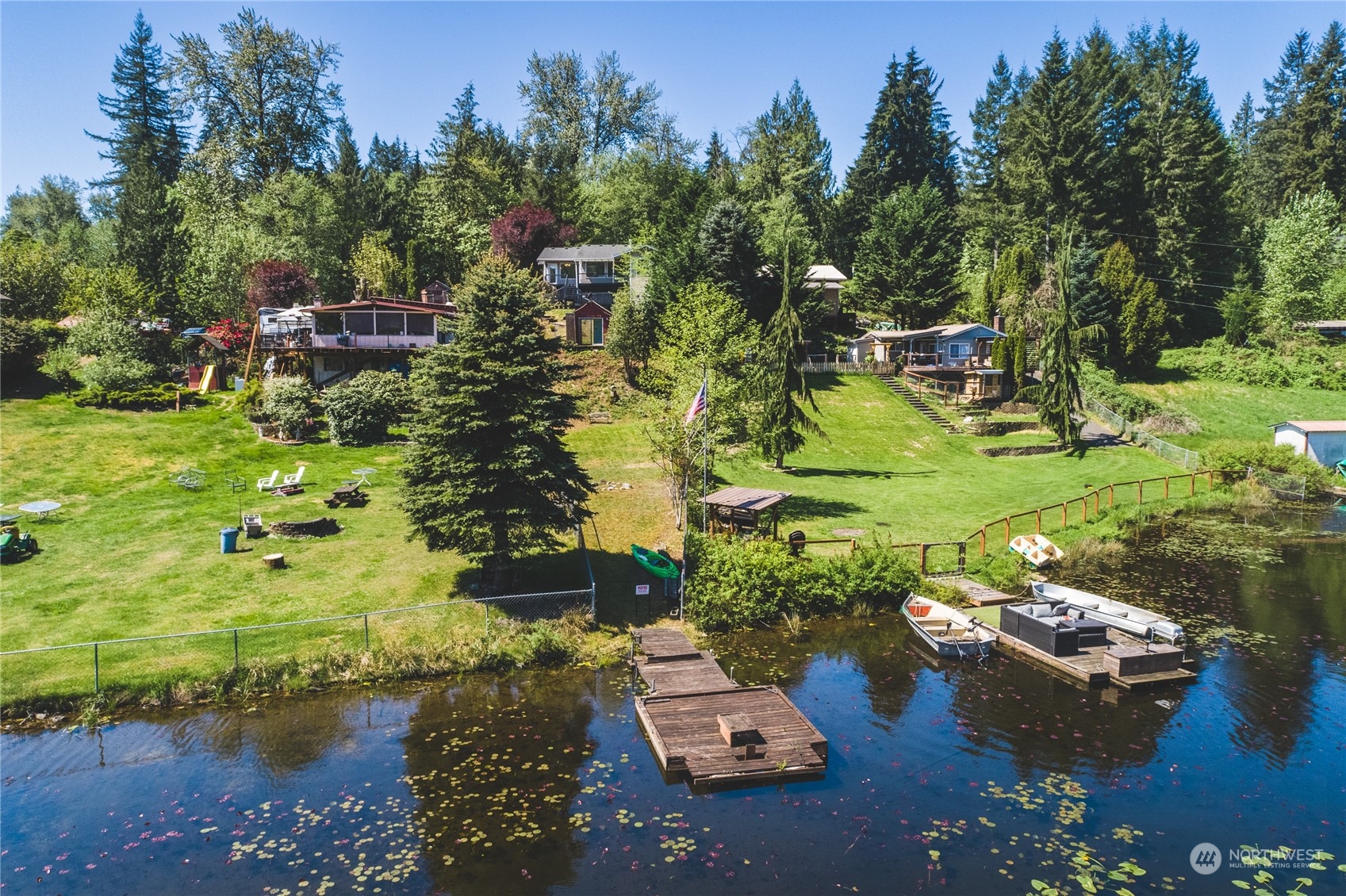 5701 Lerch Road Snohomish, WA 98290 - Photo 28 of 34 an aerial view of a house with a yard lake lake and mountain view in back