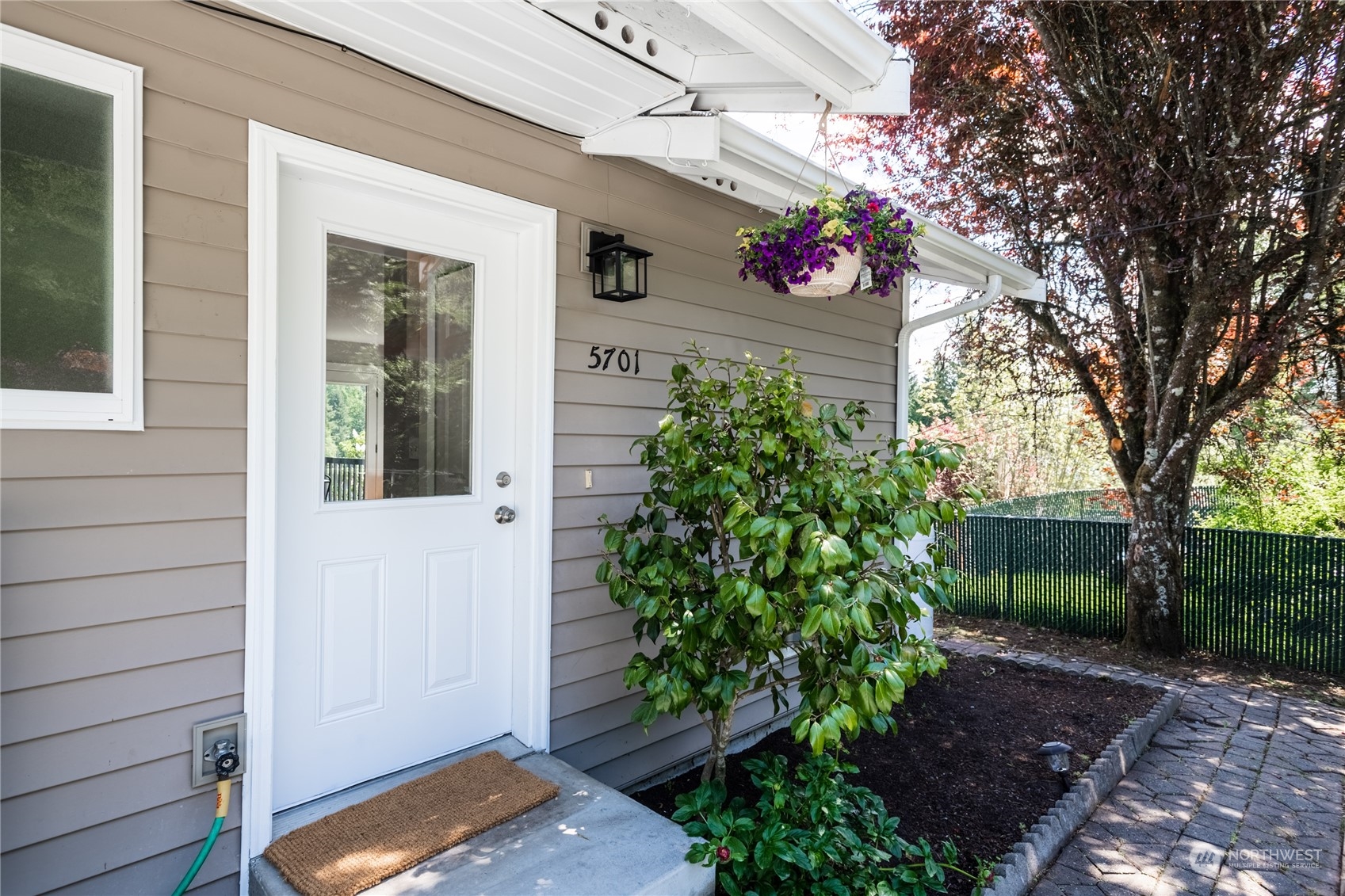 5701 Lerch Road Snohomish, WA 98290 - Photo 3 of 34 a flower plants in front of a house