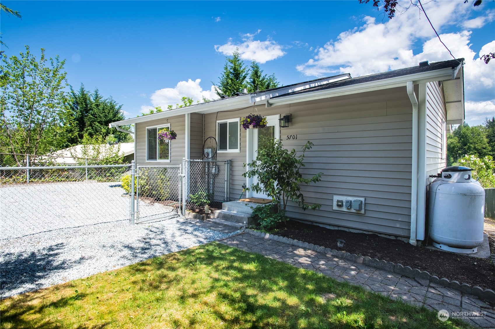 5701 Lerch Road Snohomish, WA 98290 - Photo 34 of 34 a view of a house with a yard and potted plants