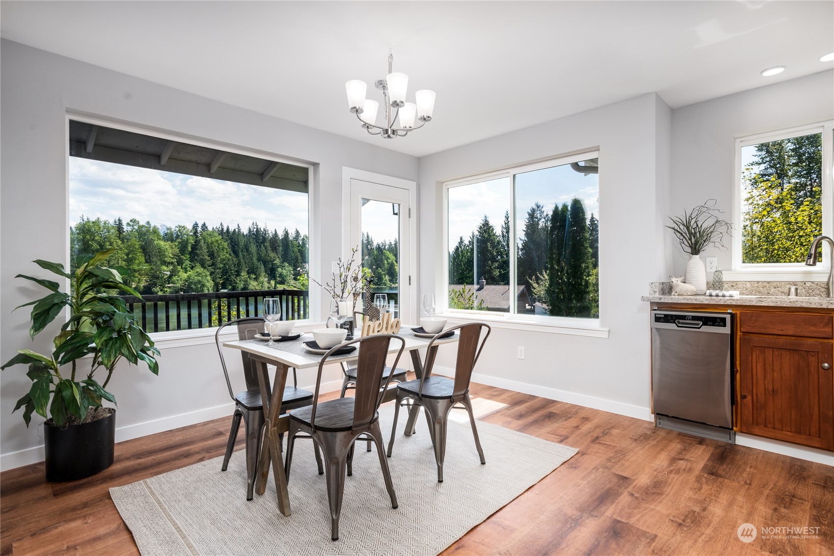 5701 Lerch Road Snohomish, WA 98290 - Photo 9 of 34 a view of a dining room with furniture window and wooden floor