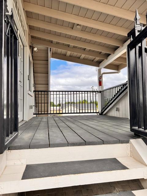 3019 Lathrop Road Manteca, CA 95336 - Photo 34 of 43 a view of balcony with wooden floor