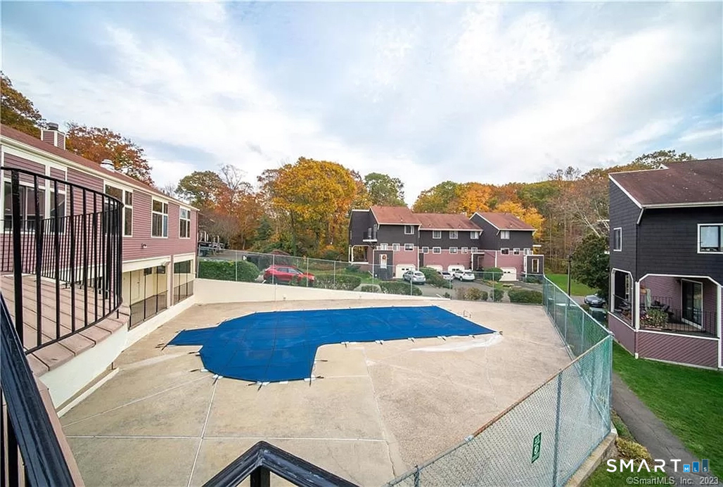 5 Stonegate Circle, Unit F Branford, CT 06405 - Photo 3 of 15 a view of a house with pool