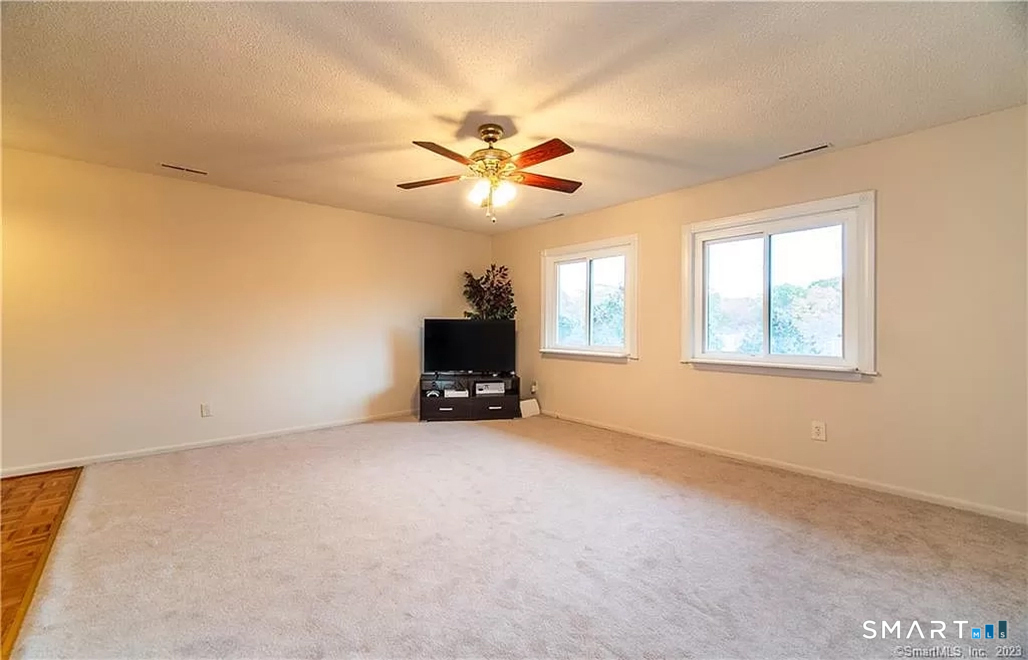 5 Stonegate Circle, Unit F Branford, CT 06405 - Photo 6 of 15 a view of an empty room with a window