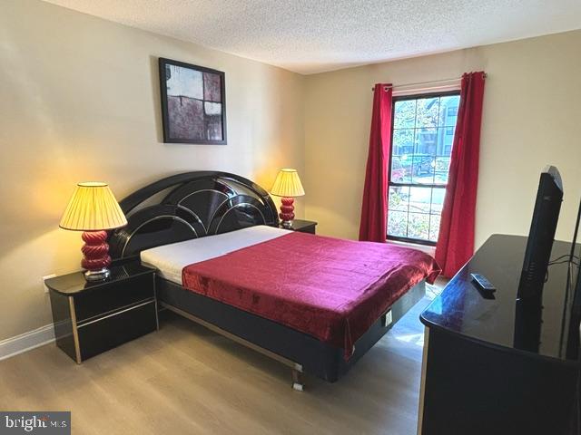 27 Gilpin Court Lawrence Township, NJ 08648 - Photo 14 of 20 a bedroom with a bed and window