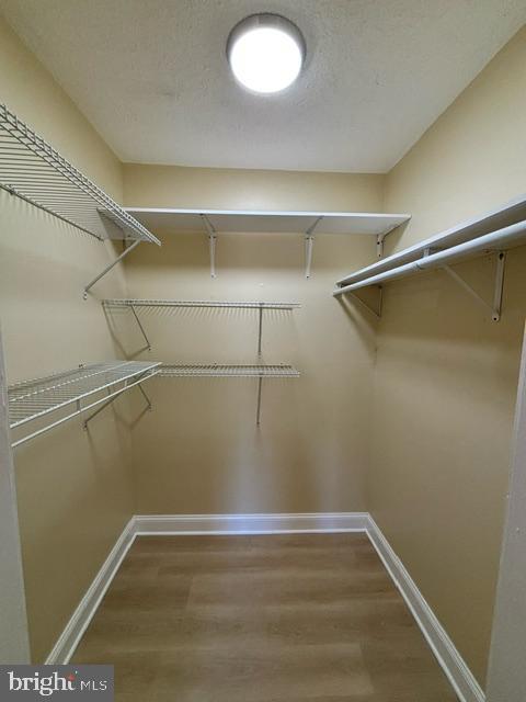 27 Gilpin Court Lawrence Township, NJ 08648 - Photo 15 of 20 a view of a room with racks on the wall