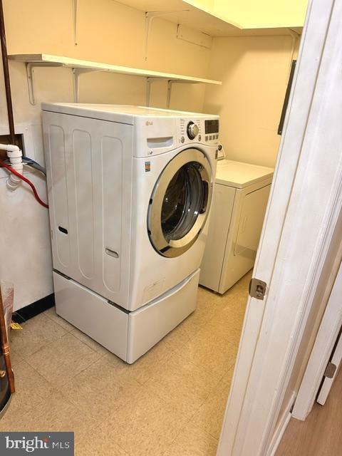 27 Gilpin Court Lawrence Township, NJ 08648 - Photo 17 of 20 a utility room with dryer and washer