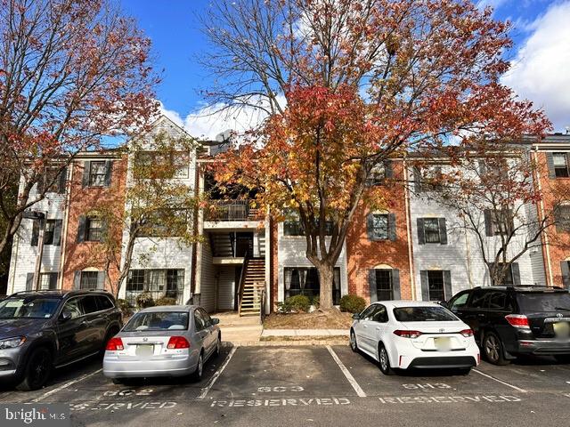 27 Gilpin Court Lawrence Township, NJ 08648 - Photo 18 of 20 a car parked on the side of a street