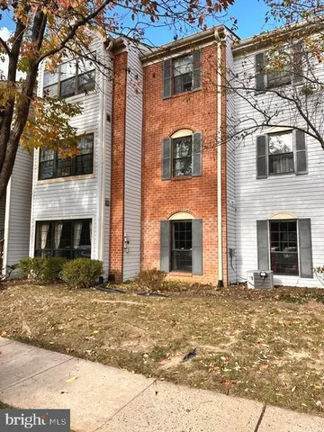 a front view of a house with yard