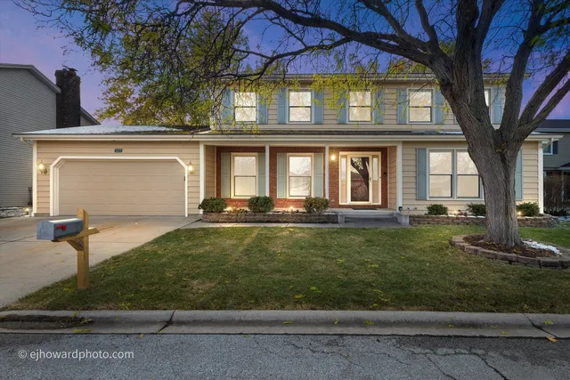 front view of house with a yard