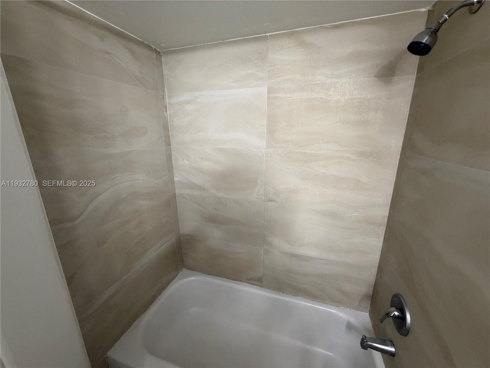510 South Park Road, Unit 3510 Hollywood, FL 33021 - Photo 12 of 13 a bathroom with a shower