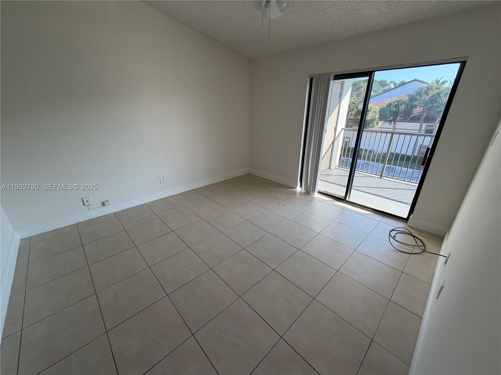 510 South Park Road, Unit 3510 Hollywood, FL 33021 - Photo 9 of 13 an empty room with windows