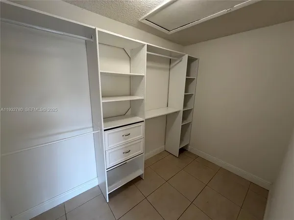 a room with storage and utility
