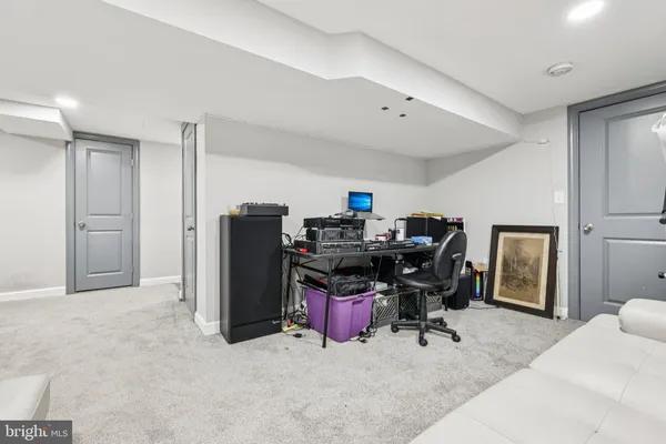 a view of a workspace with furniture