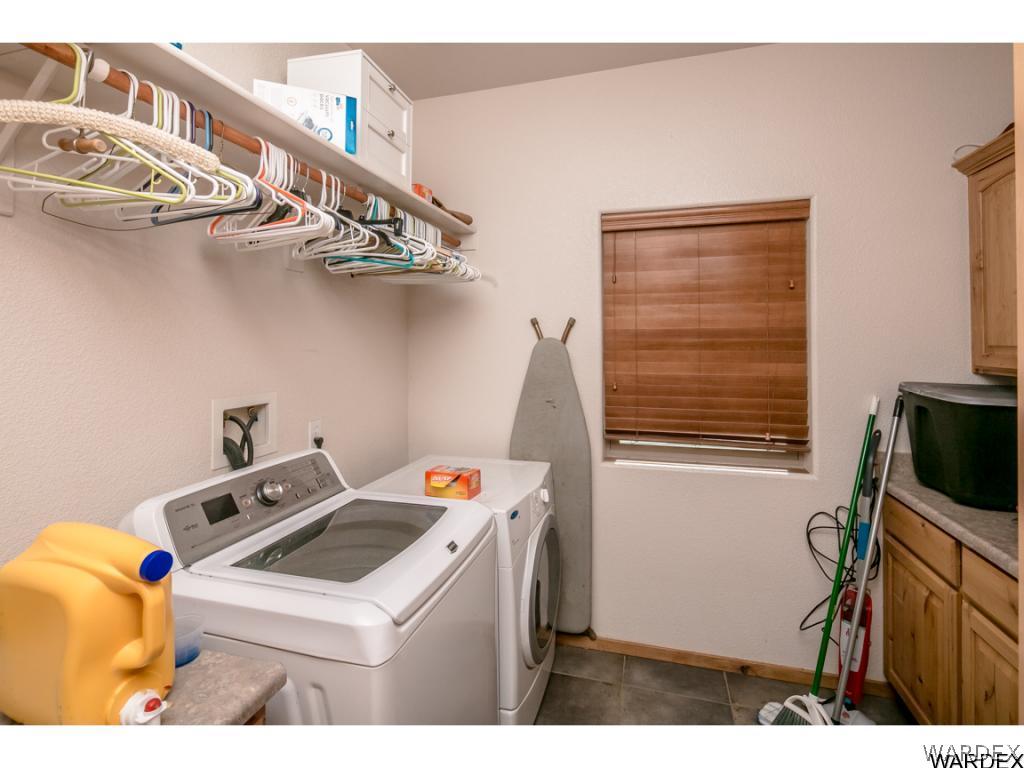 4951 North Neal Ranch Road Kingman, AZ 86401 - Photo 16 of 34 a utility room with dryer and washer
