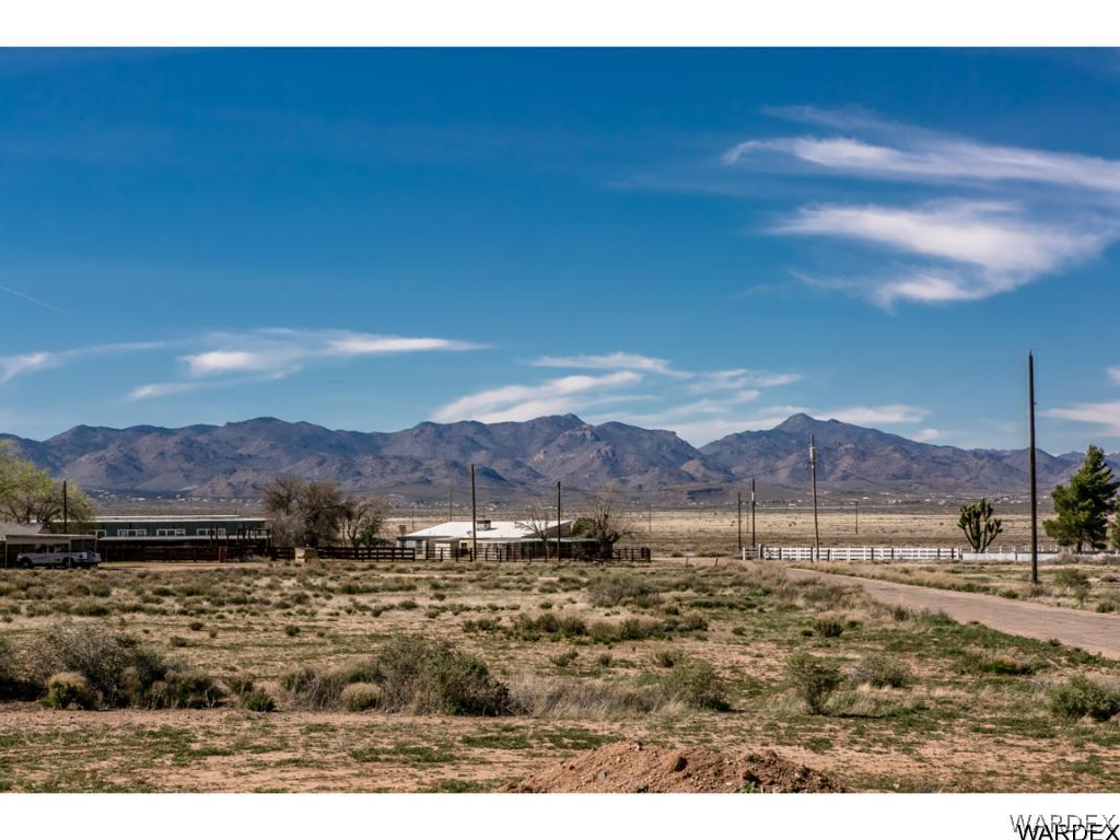 4951 North Neal Ranch Road Kingman, AZ 86401 - Photo 19 of 34 a view of an houses with a yard and mountain view