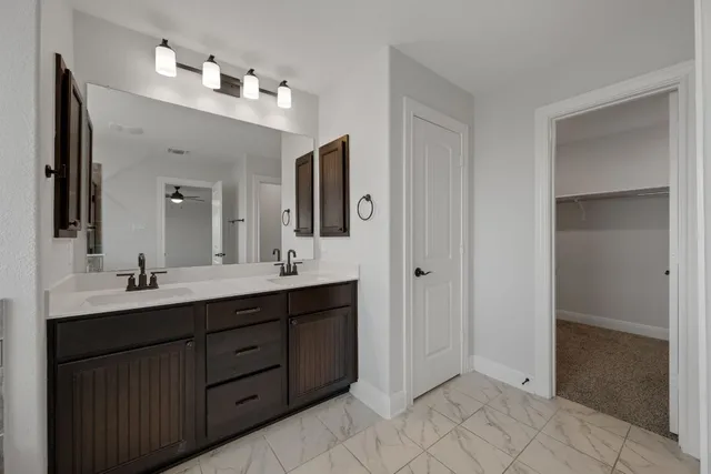 a view of a room with shelf on the wall