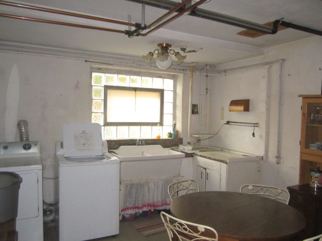 2926 Harlem Avenue Riverside, IL 60546 - Photo 15 of 20 a room with a window a sink and a table