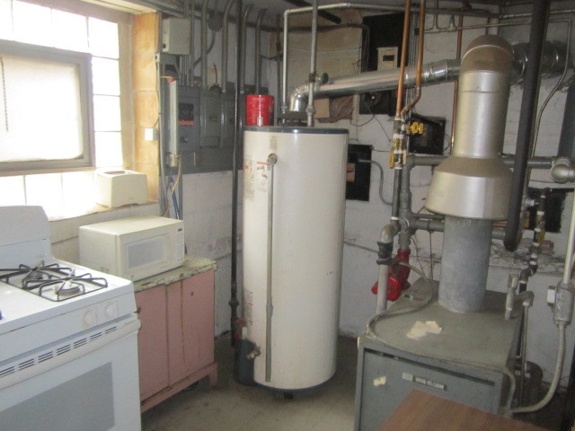 2926 Harlem Avenue Riverside, IL 60546 - Photo 16 of 20 a kitchen with a refrigerator and a stove