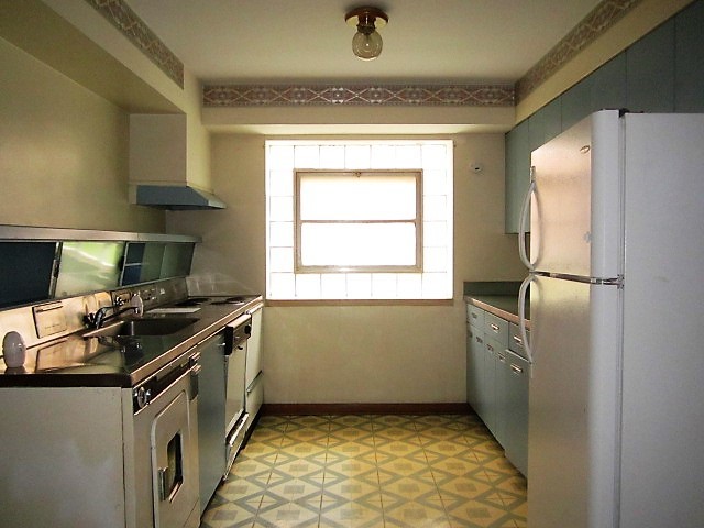 2926 Harlem Avenue Riverside, IL 60546 - Photo 20 of 20 a kitchen with granite countertop a sink stove and refrigerator