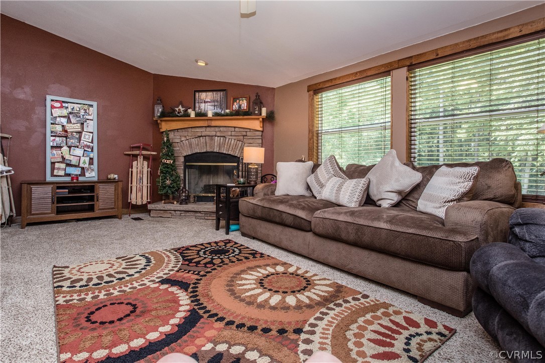 9106 Rowanty Road Carson, VA 23830 - Photo 8 of 34 This living room is amazing. The wood burning fir