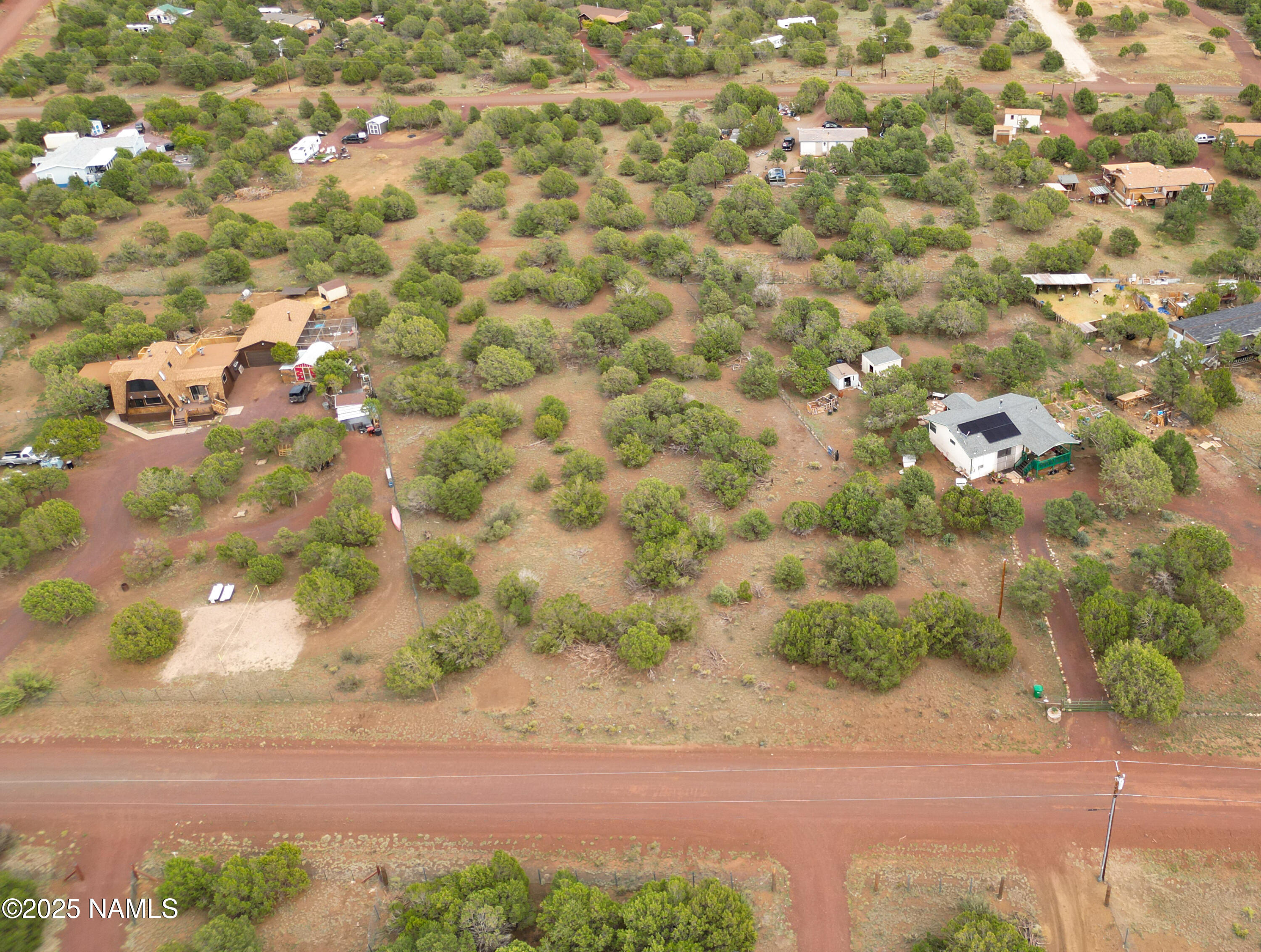 7365 North Hopi Street Williams, AZ 86046 - Photo 2 of 12 a view of a yard with pathway