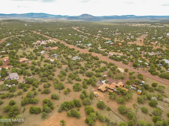 a view of an ocean from a mountain