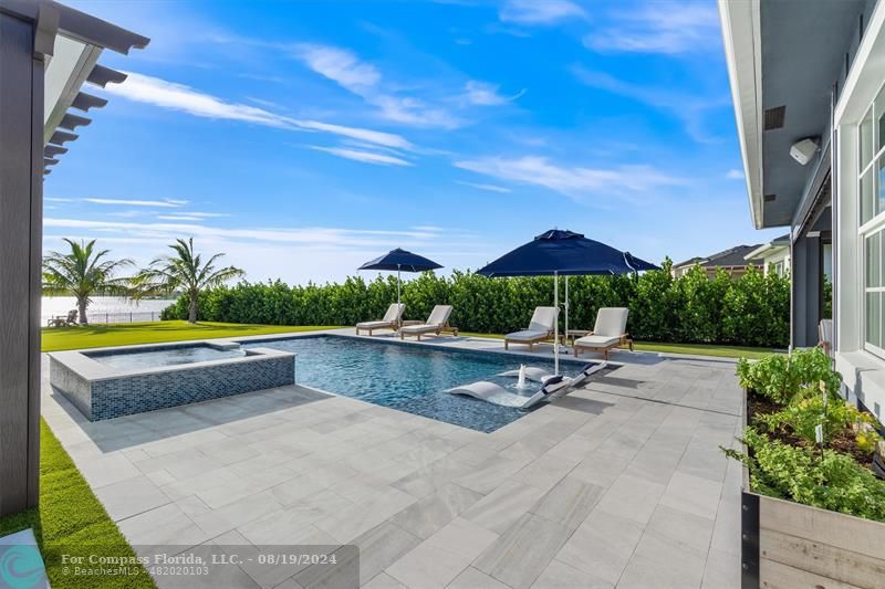 793 Hookline Circle Loxahatchee, FL 33470 - Photo 22 of 80 Heated saltwater pool with Spa