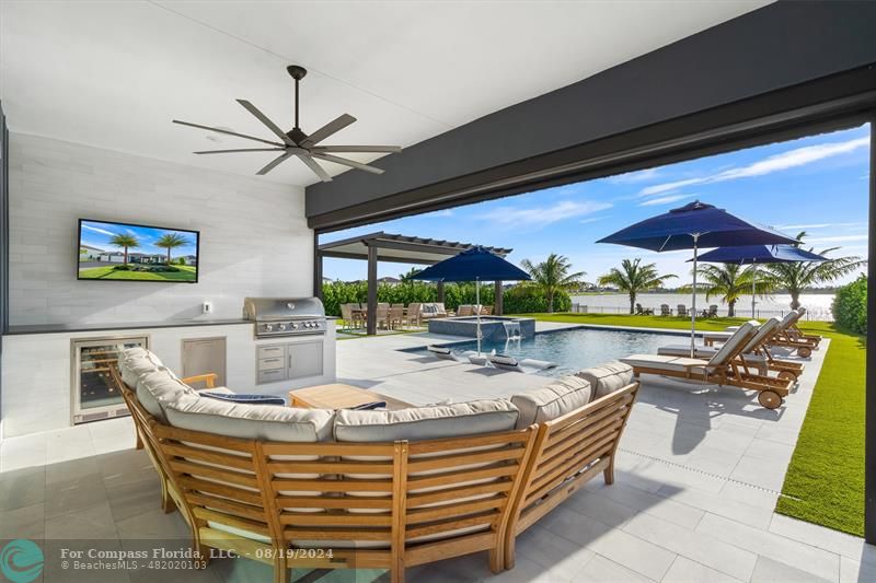 793 Hookline Circle Loxahatchee, FL 33470 - Photo 24 of 80 a dining room with furniture and a large window