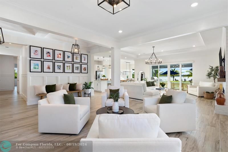 793 Hookline Circle Loxahatchee, FL 33470 - Photo 9 of 80 a living room with furniture and a book shelf