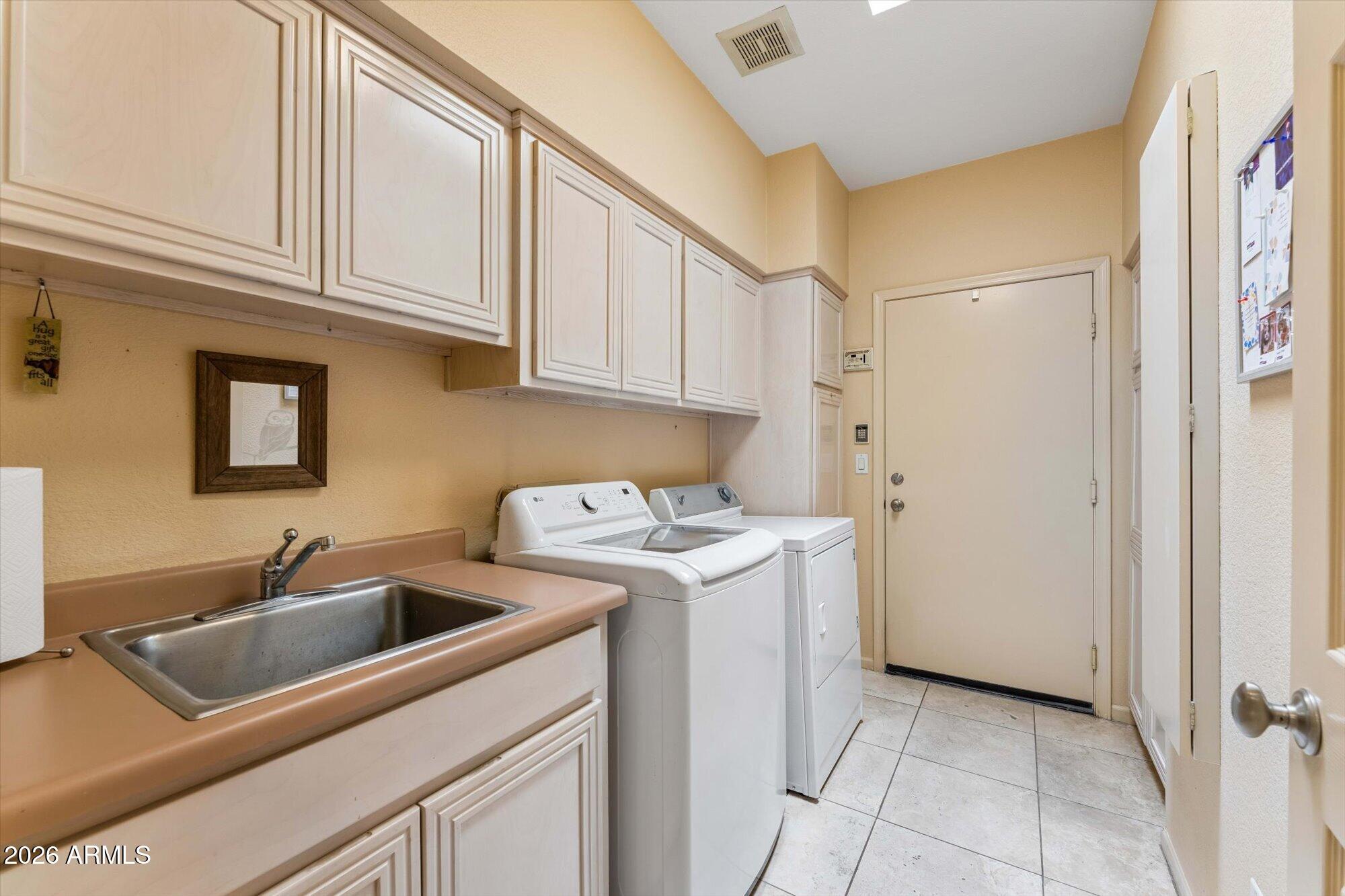 7740 East Gainey Ranch Road, Unit 49 Scottsdale, AZ 85258 - Photo 14 of 31 Laundry Room