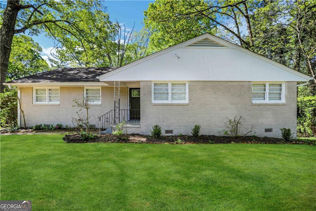 a front view of house with yard