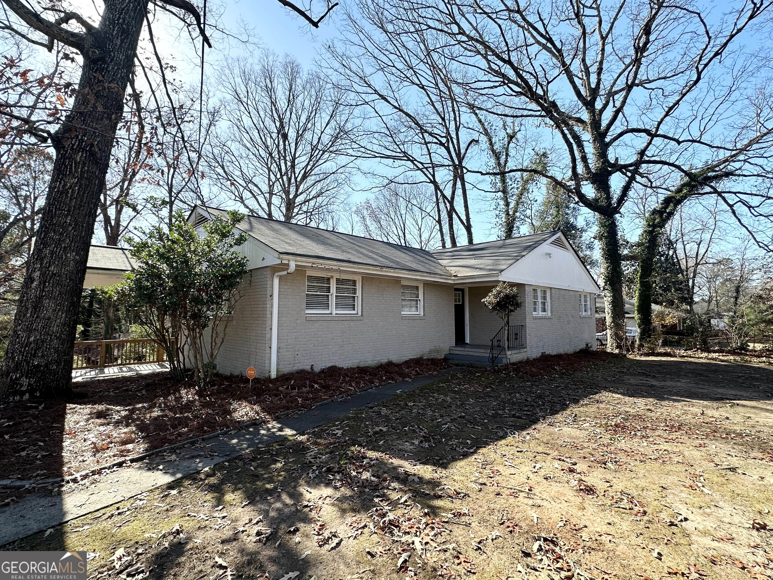 2896 Hogan Road East Point, GA 30344 - Photo 2 of 14 a front view of a house with a yard