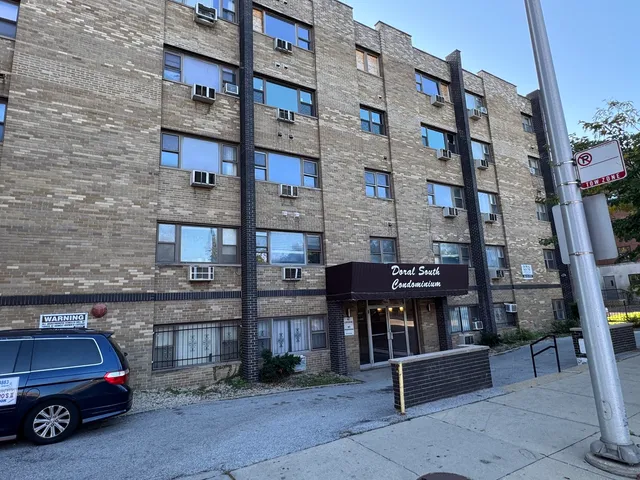a car parked in front of a building