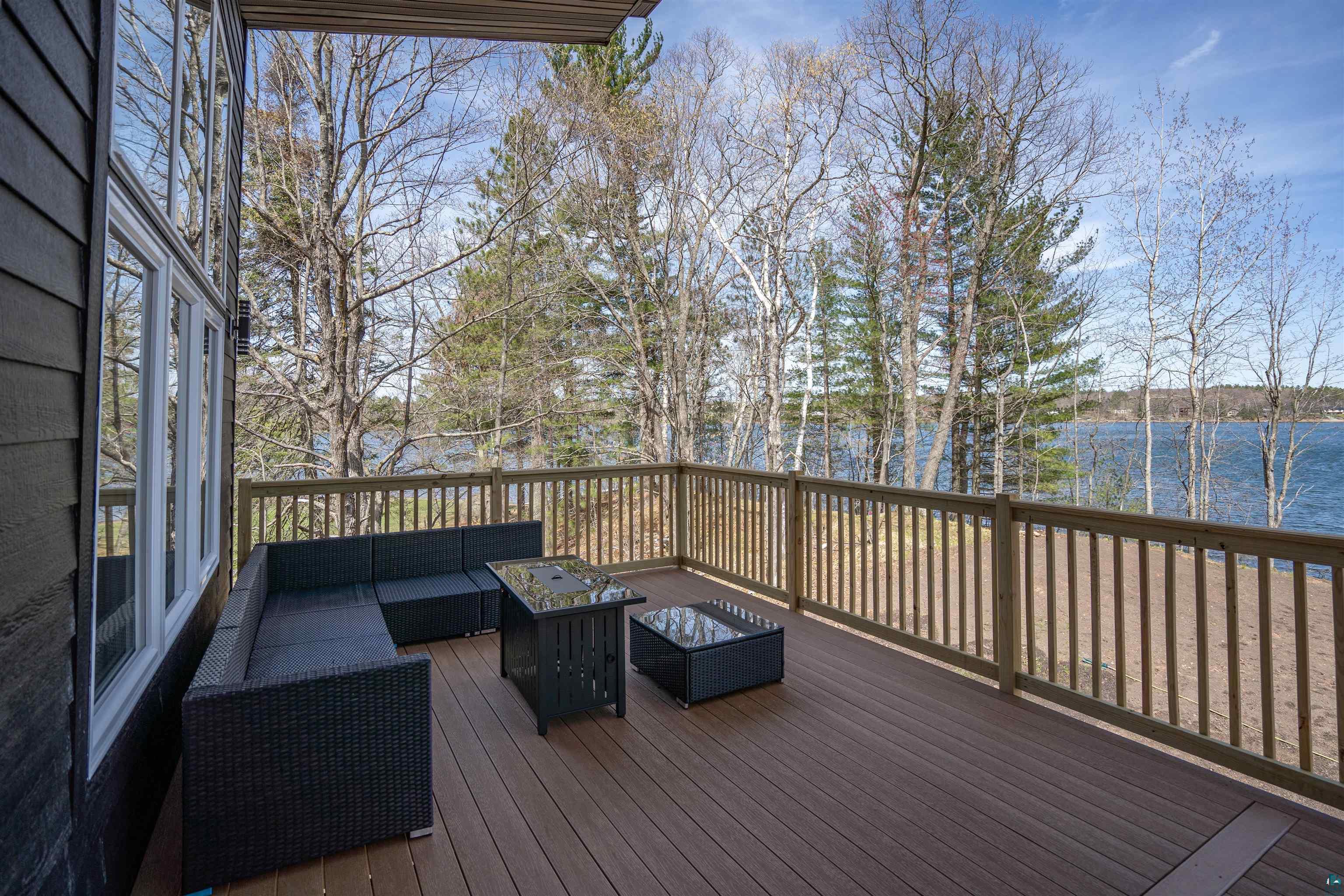 2000 West Chub Lake Road Carlton, MN 55718 - Photo 6 of 30 Expansive outdoor deck featuring composite flooring and a wood railing
