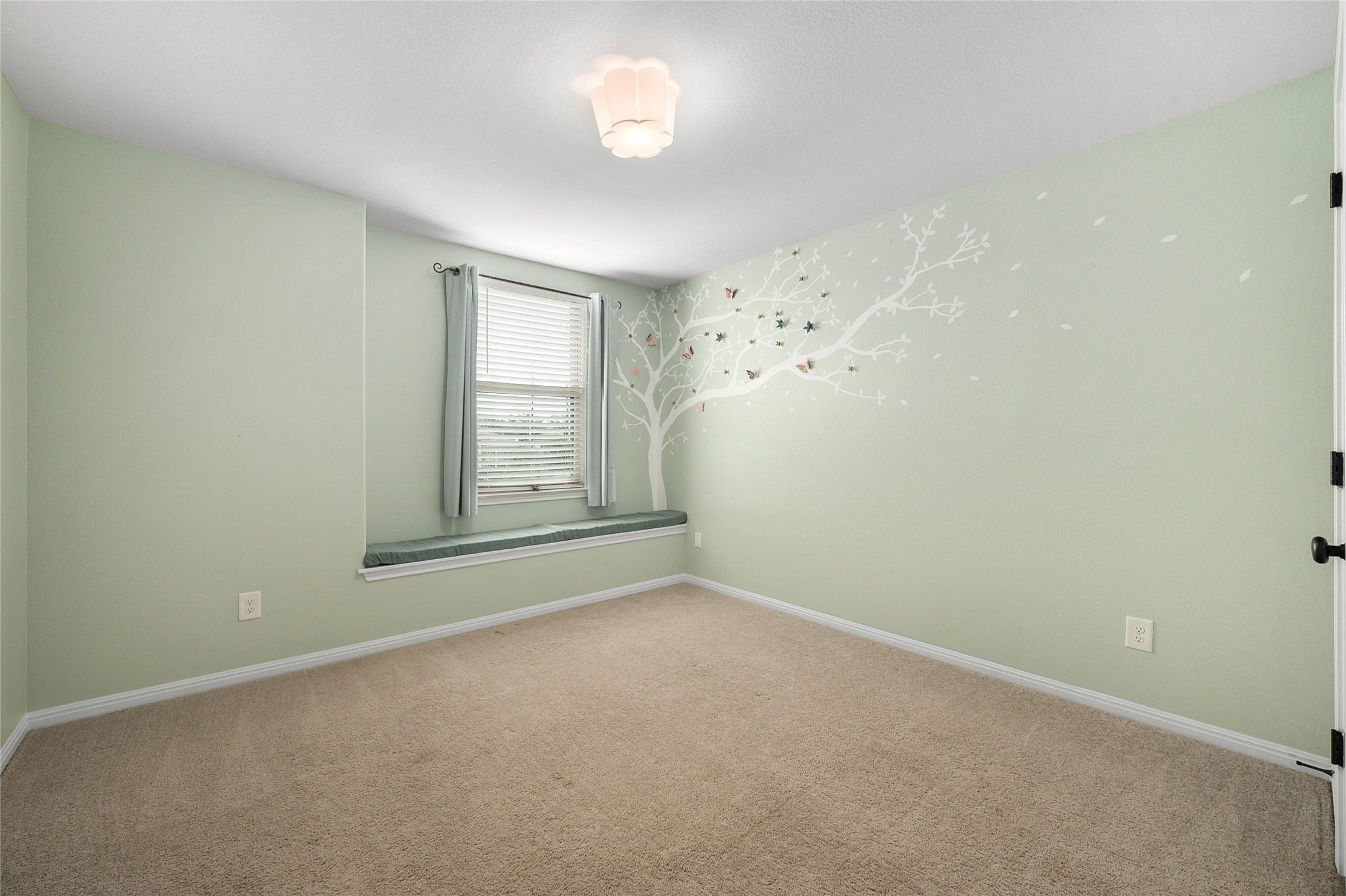 101 Lambert Street Leander, TX 78641 - Photo 24 of 33 A window seat offers a cozy retreat in this naturally illuminated room.