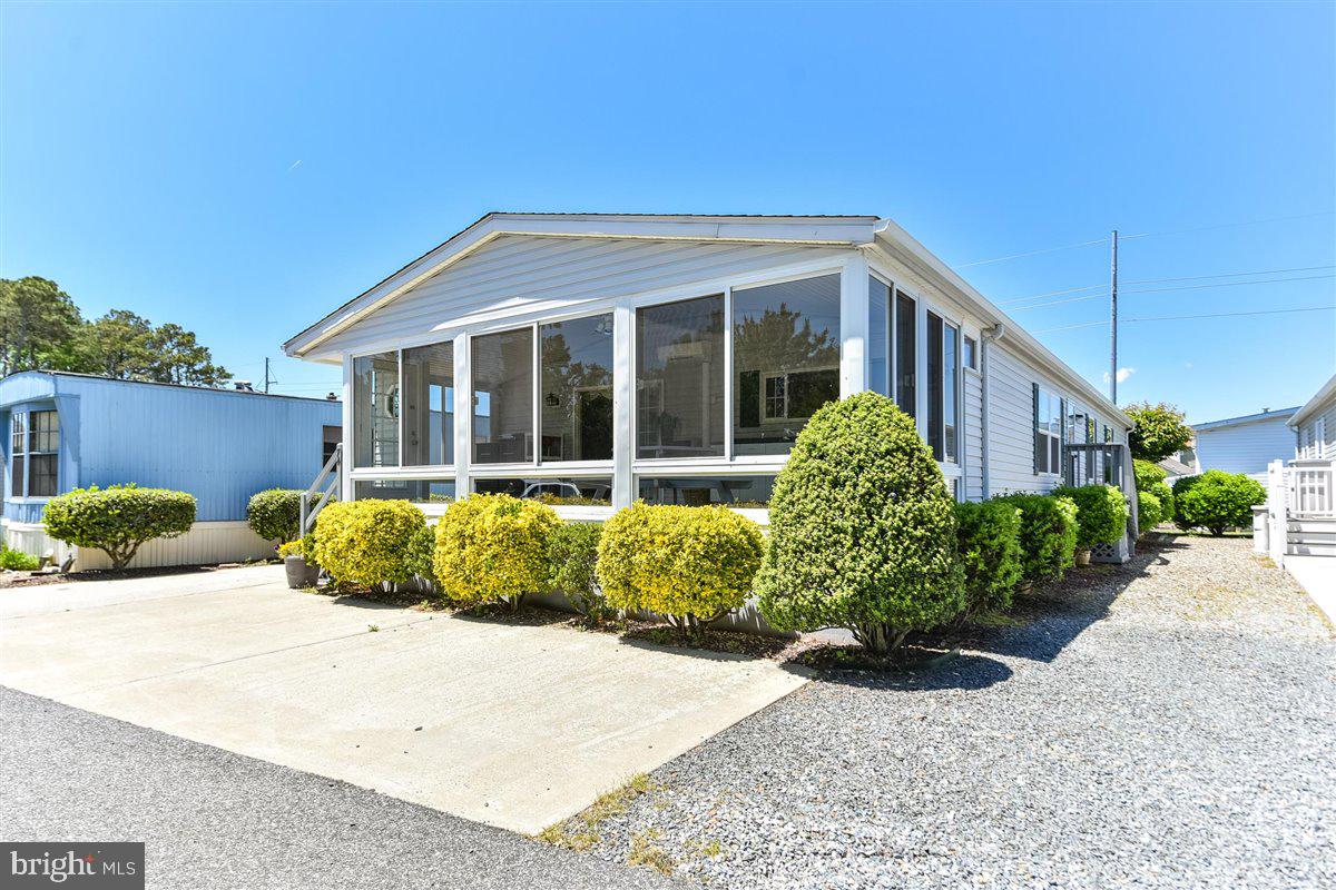 9916 Row Golf Course Road, Unit D 74 Ocean City, MD 21842 - Photo 2 of 31 ENCLOSED PORCH
