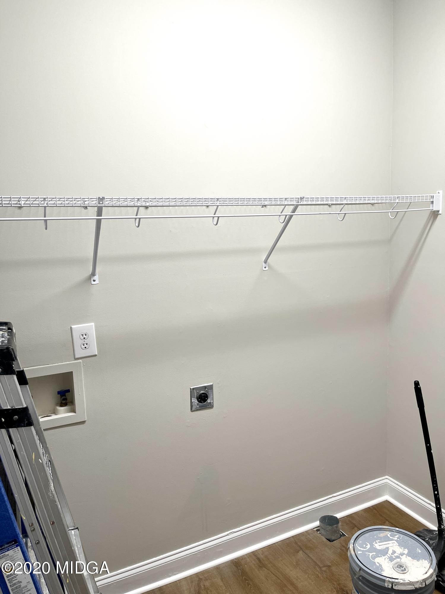 284 Klopfer Road Juliette, GA 31046 - Photo 14 of 15 a view of a room with racks on the wall