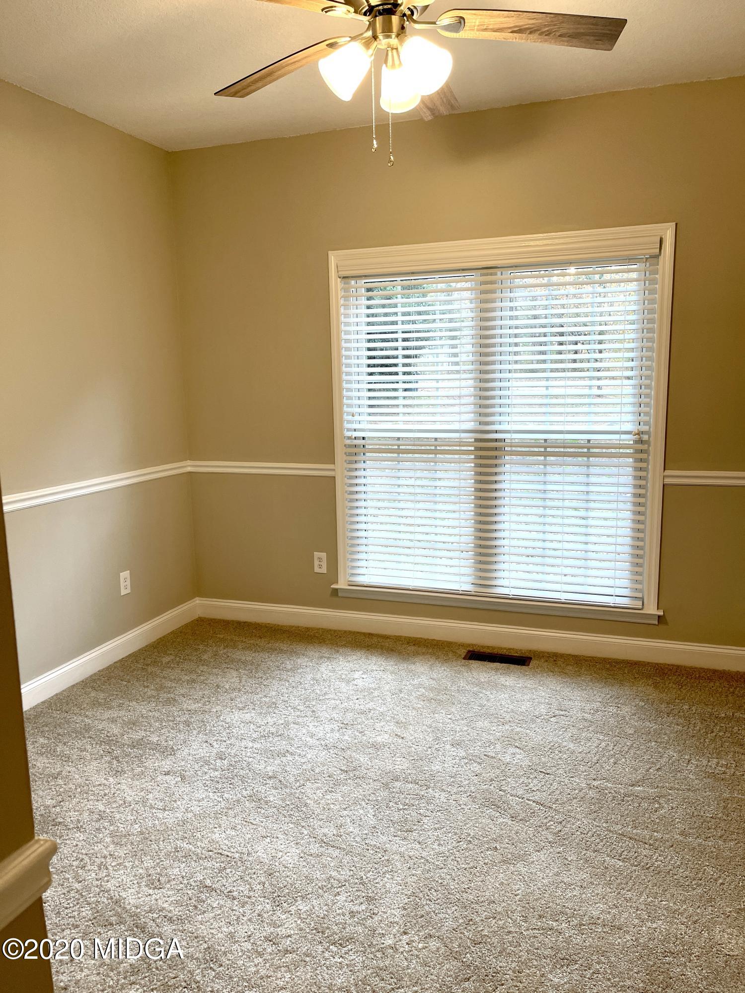 284 Klopfer Road Juliette, GA 31046 - Photo 7 of 15 a view of an empty room with a window