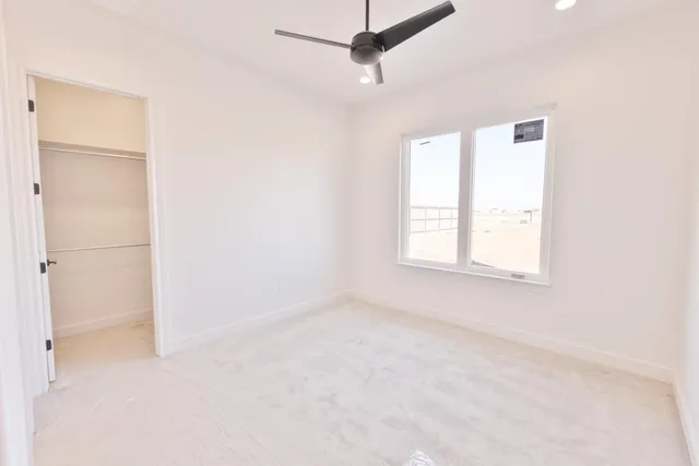 a view of a window in an empty room