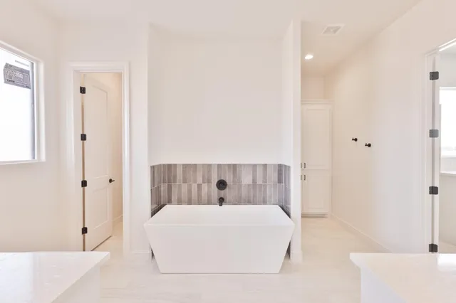 a view of cabinets with wooden floor