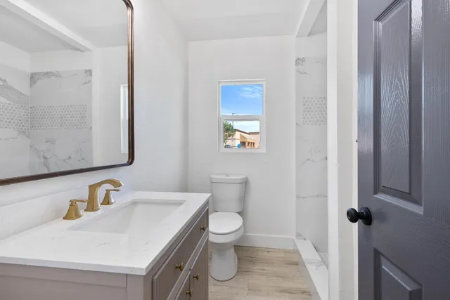a bathroom with a sink and a toilet