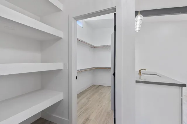 a view of an empty walk in closet