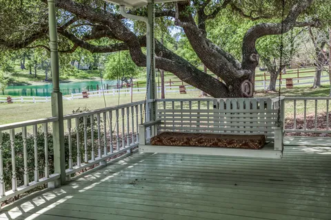 a view of a yard with tree s