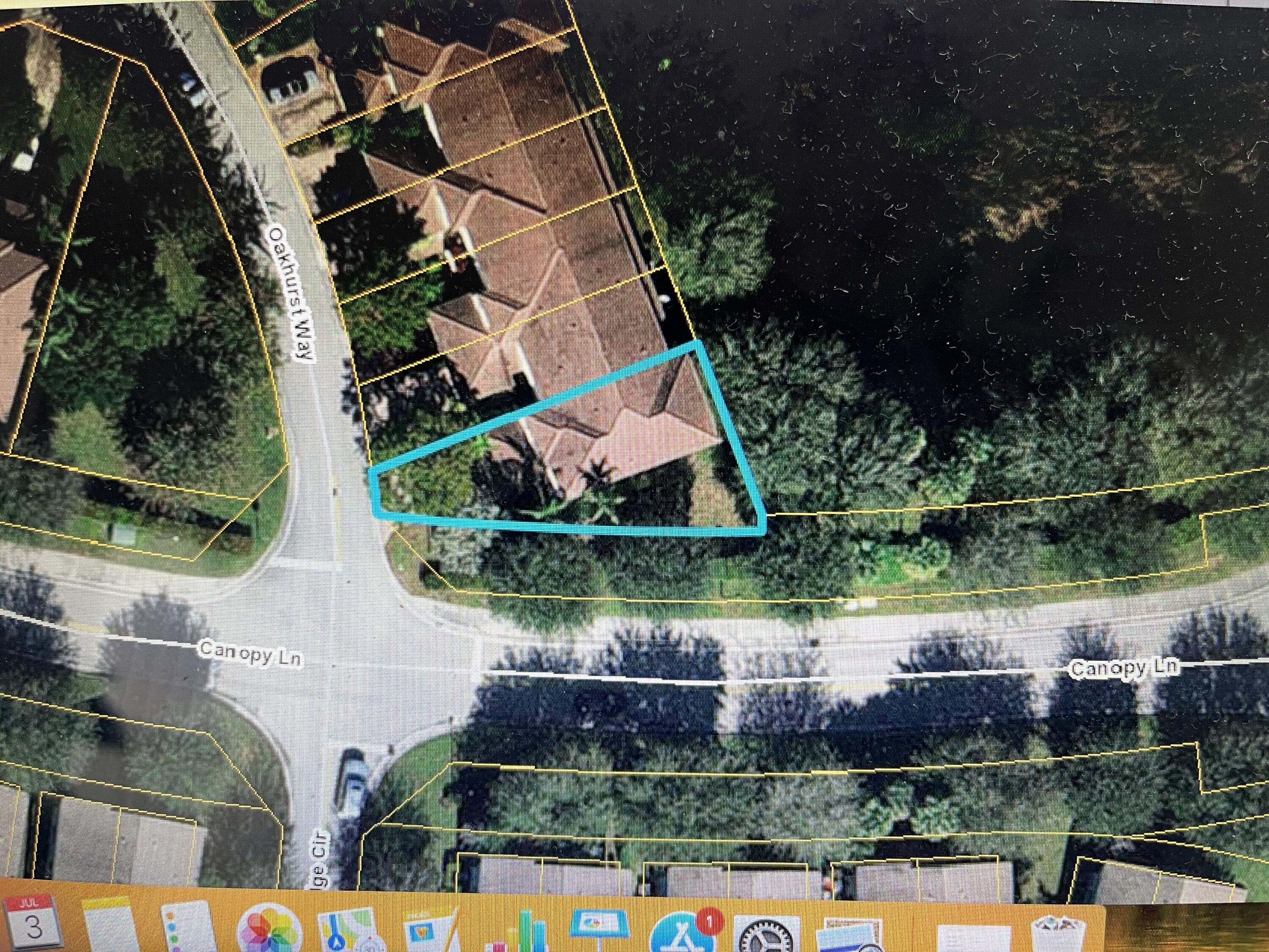 2001 Oakhurst Way Riviera Beach, FL 33404 - Photo 23 of 33 an aerial view of a house with a yard and potted plants