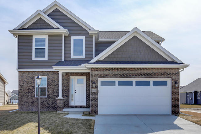 2003 Rylan Road Mahomet, IL 61853 - Photo 1 of 41 a front view of a house with a yard